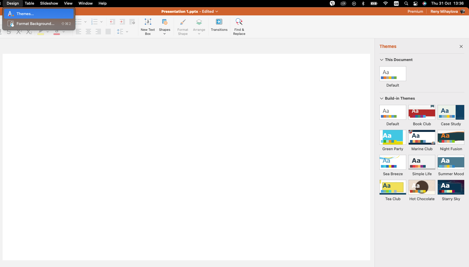 A presentation slide editor showing a blank slide with a sidebar displaying various design themes on the right.